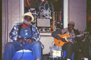 Grandpa Elliott (Elliott Small) and Stony B (Michael Stone) performing at a corner on Royal Street.