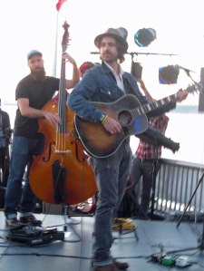 Bradley Laina, guitar, and Sander Vinberg, bass, go through a sound check prior to performing on the Seattle waterfront last summer.