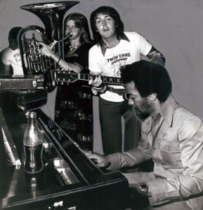 Linda and Paul McCartney performing with Allen Toussaint in his New Orleans studio in 1975.