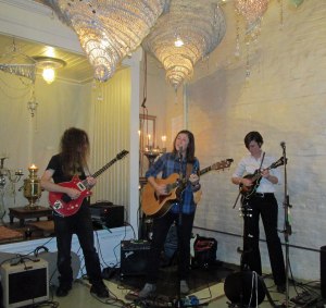 Kelcy Mae, center, performed with her band at the Milo Music Parlor in early April.