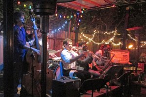 Places with courtyards, patios and balconies can still allow smoker unless, like Bacchanal, the owners prohibit smoking. The Roamin's Jasmine playing in the courtyard.