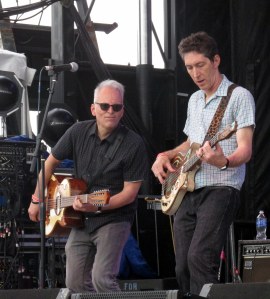 The Iguanas made a temporary home in Austin while waiting to return to New Orleans. Joe Cabral (left) and Rene' Coman performing at French Quarter Festival this year.